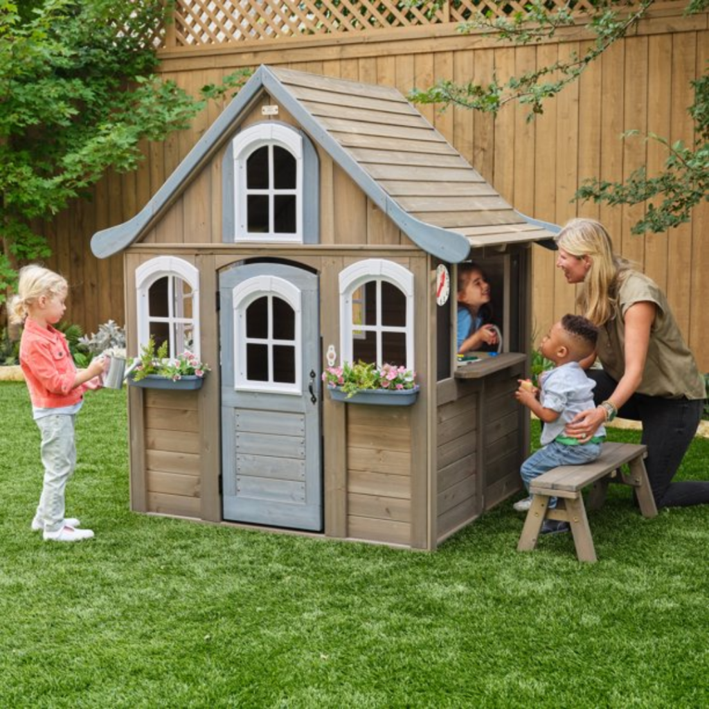 The KidKraft Forestview II Outdoor Wooden Playhouse is the perfect hideaway for your little ones. It features a covered porch, working door and shutters, and large windows that let in plenty of light. 