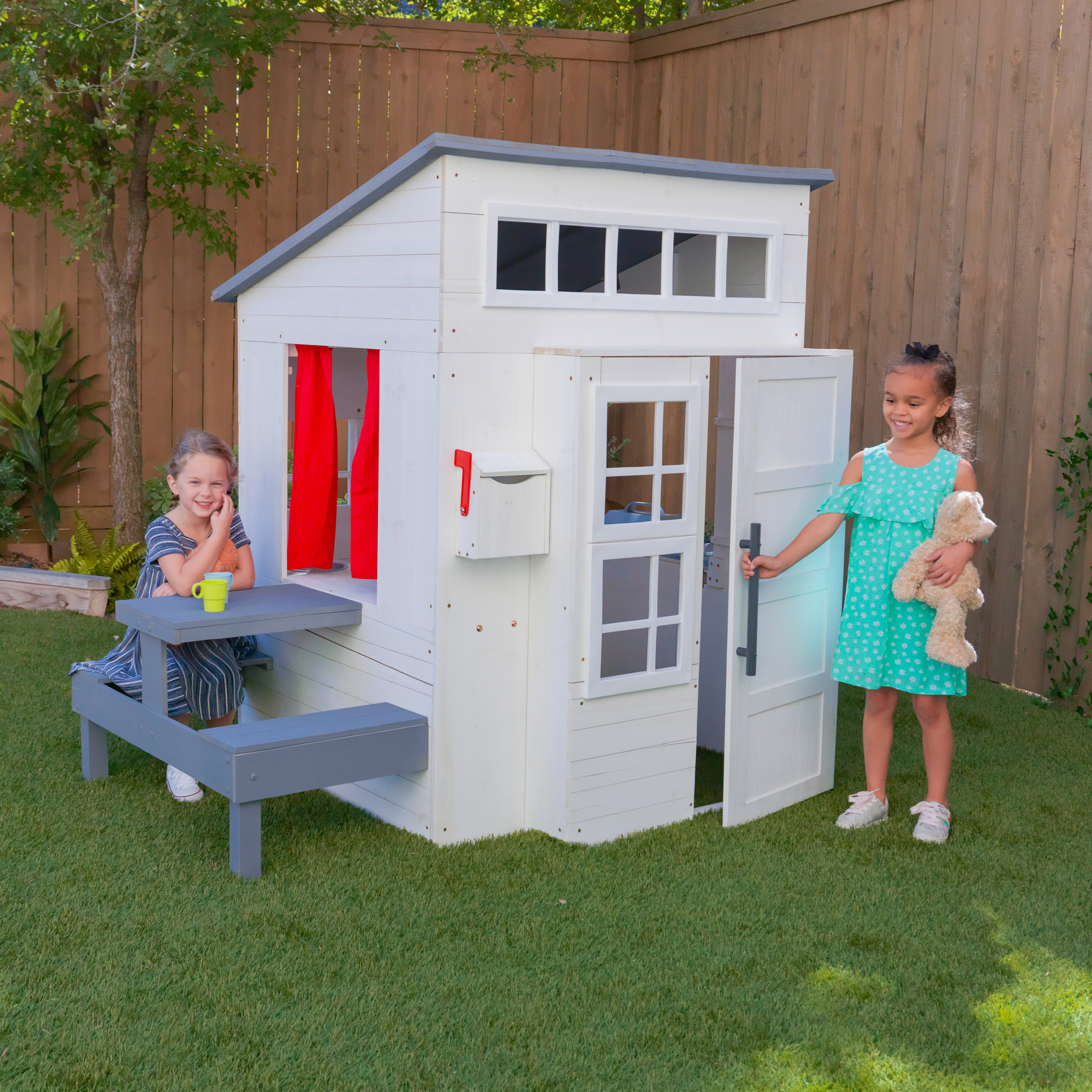 This modern wooden playhouse for toddlers and kids is perfect for a makeover or just leave it how it comes!  For the size and accessories this is a very affordable wooden playhouse for HOURS of fun. 