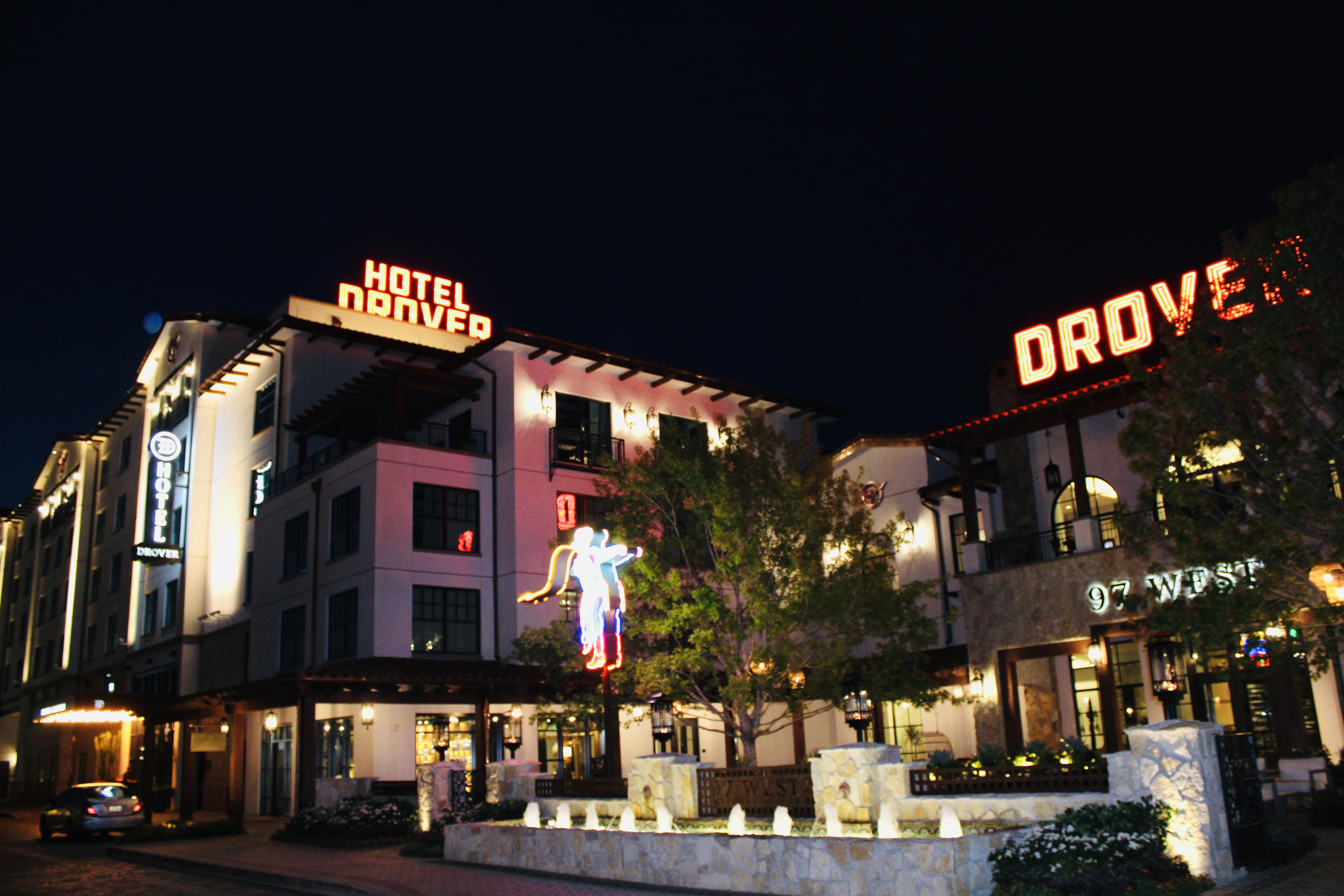Fort Worth Drover Hotel in downtown Fort Worth, at night. The neon cowboy is awesome.