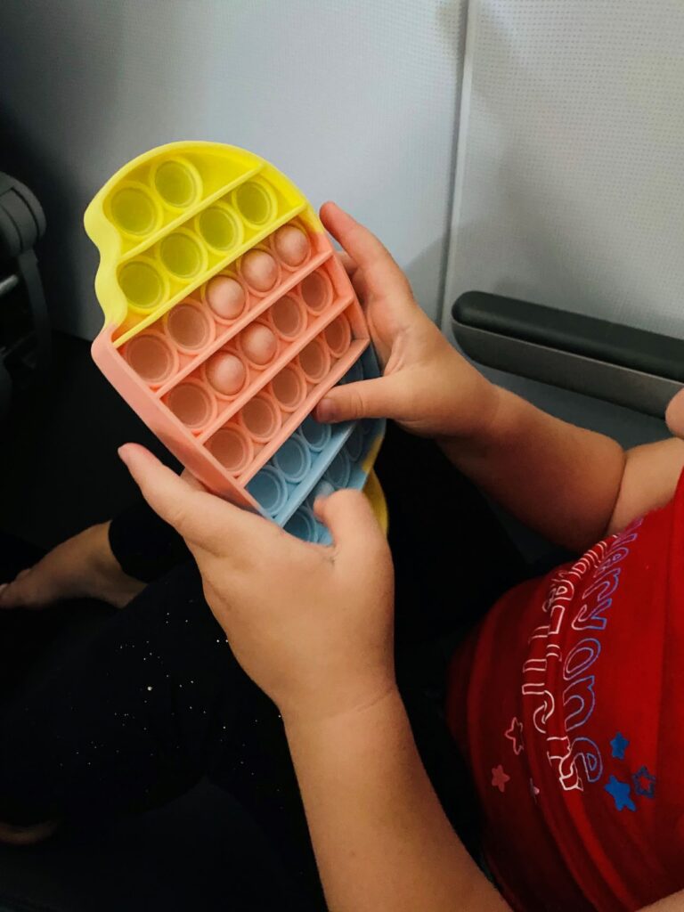While traveling with toddlers, its important to bring items and toys they have never seen or played with, this will keep them busy just a little while longer :) 