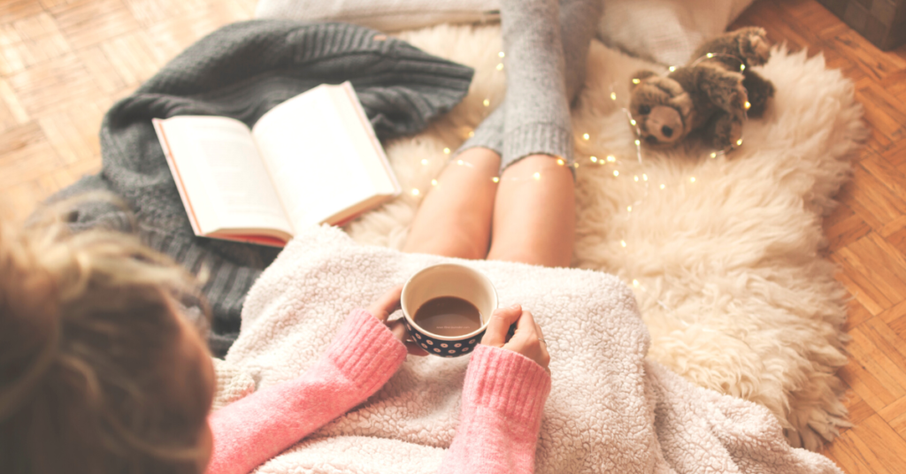 Add some winter essentials for the homes such as blankets, candles, and good books!